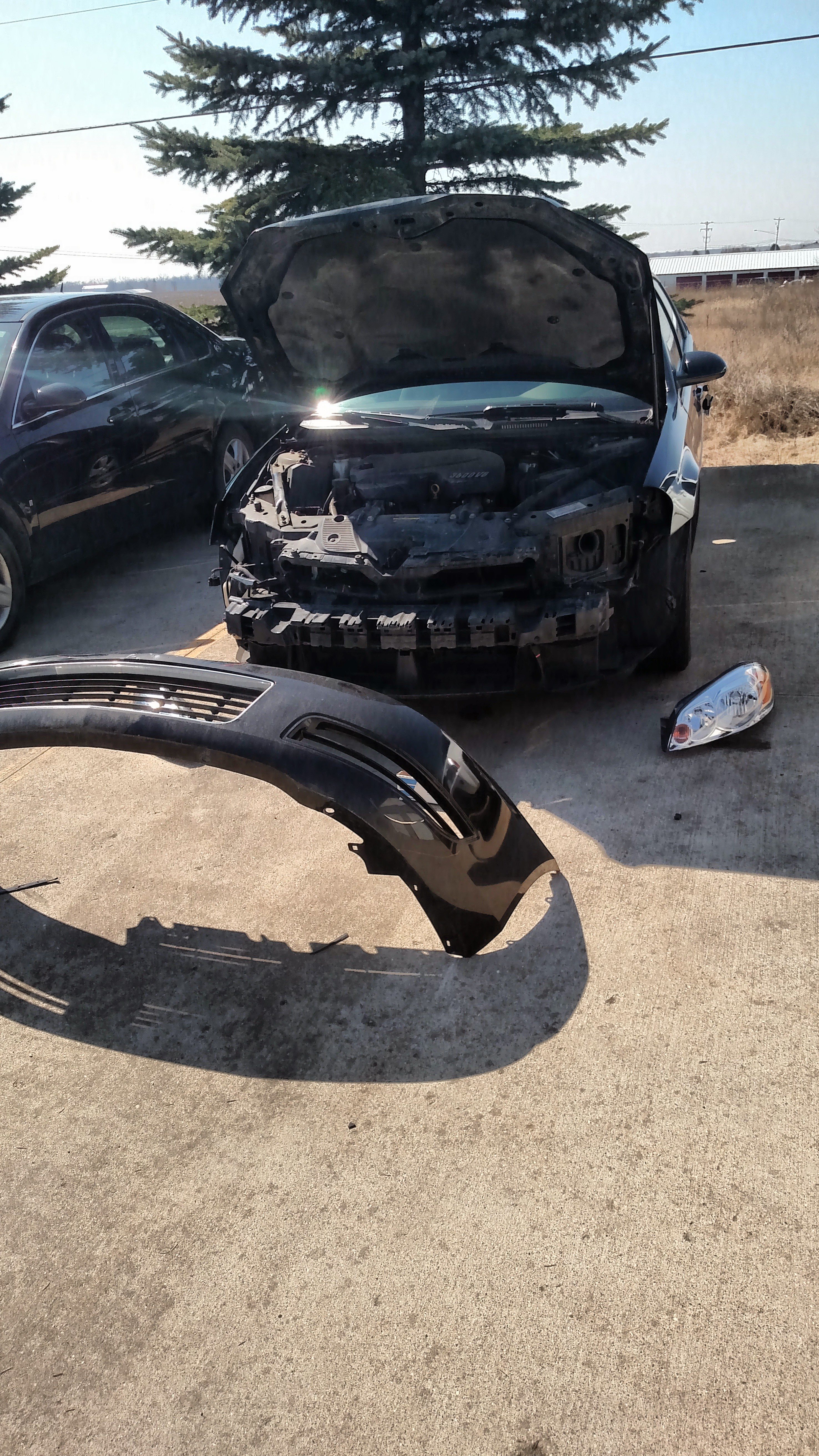 Damaged vehicle front with detached bumper and headlight, highlighting deer collision repair needs at Lyles Collision in Grand Ledge.